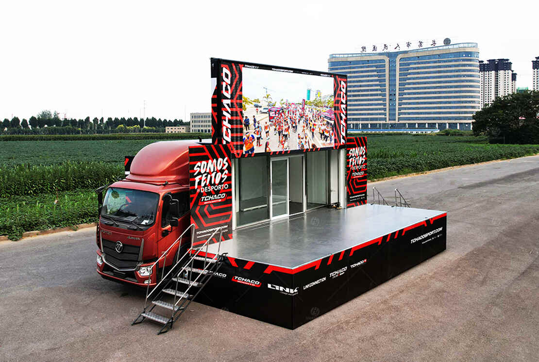 LR235 LED roadshow truck with an outdoor screen and hydraulic stage deployed for a sports promotion event