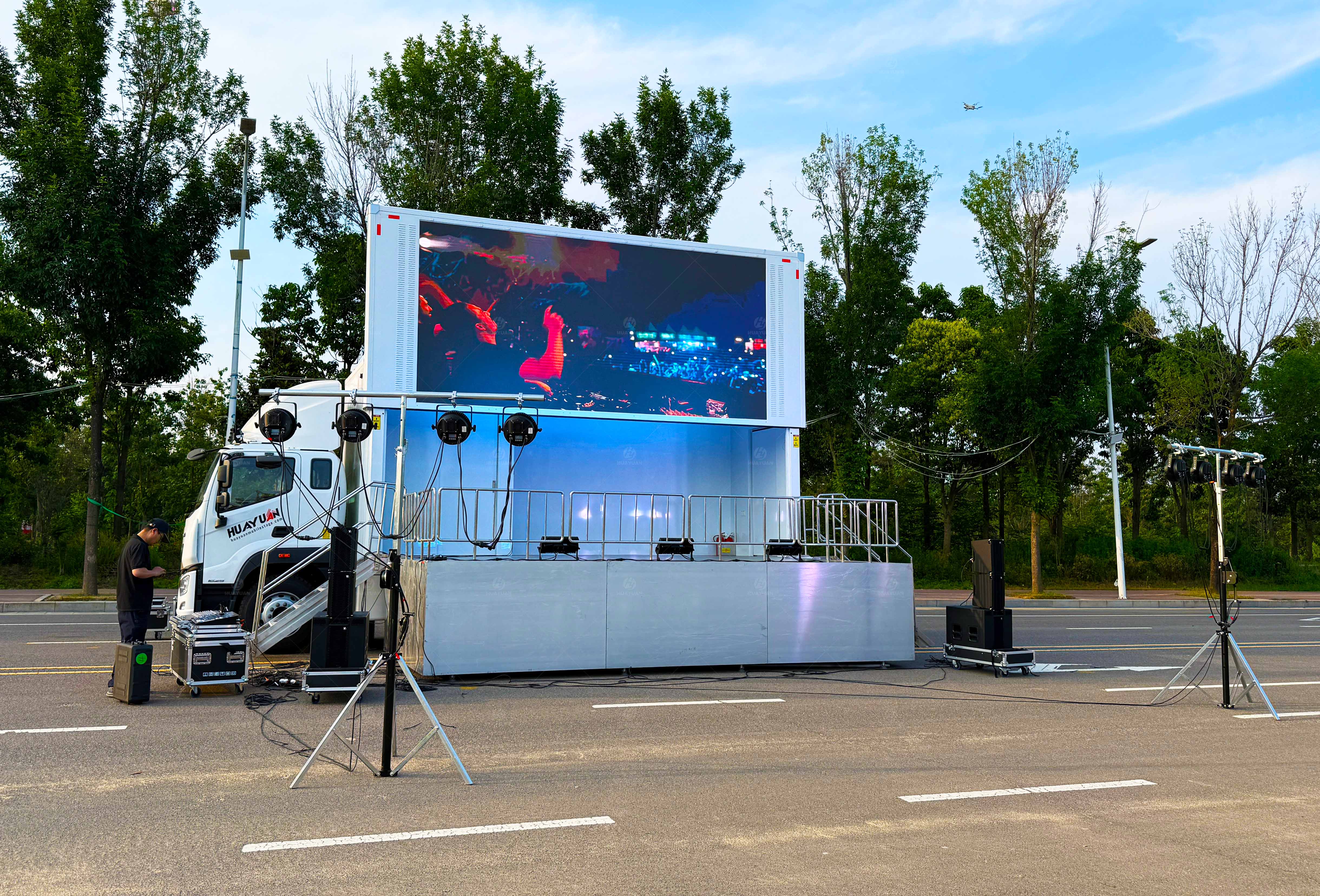 A mobile stage with lighting and sound equipment